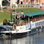 the Jadwiga cruise ship sailing across the river