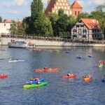 colorful kayaks sailing on the Brda river