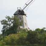 Palczewo, a wooden windmill among trees