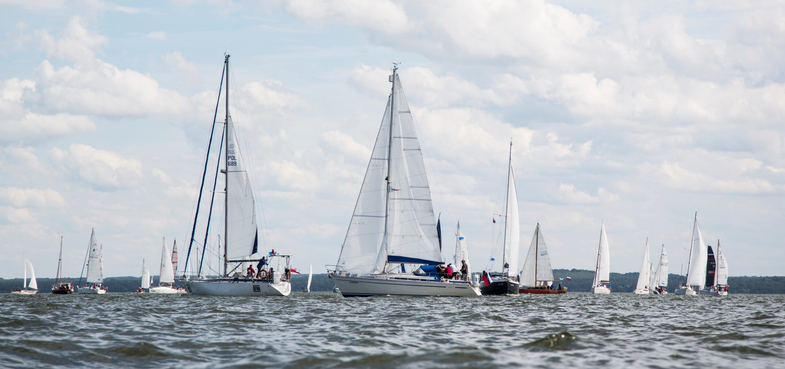 White sails on the Vistula Lagoon with the Marshal’s Cup Regatta